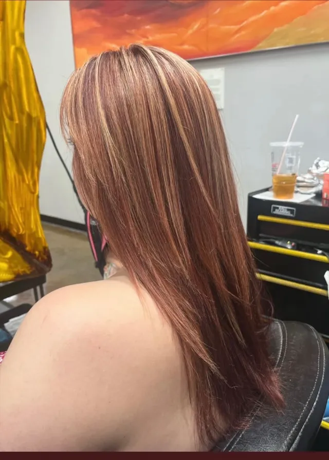 Copper and auburn hair with lighter dimensional ribbons.
